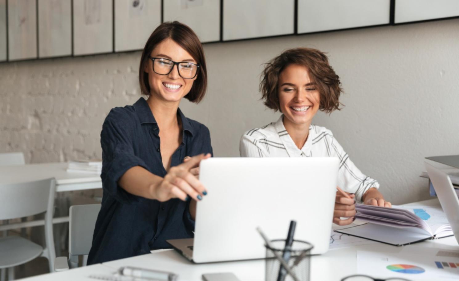 Collaborative team meeting discussing social media strategy